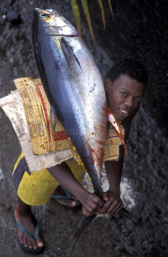 A men in the city of Moutsamudu on the Island of Anjouan on the Comoros Ilands in the Indian Ocean in Africa. A men in the city of Moutsamudu on the Island of Anjouan on the Comoros Ilands in the Indian Ocean in Africa.