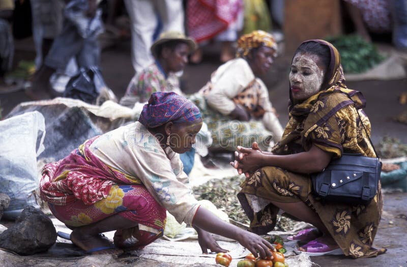 Women at the Market in the city of Moutsamudu on the Island of Anjouan on the Comoros Ilands in the Indian Ocean in Africa. Women at the Market in the city of Moutsamudu on the Island of Anjouan on the Comoros Ilands in the Indian Ocean in Africa.