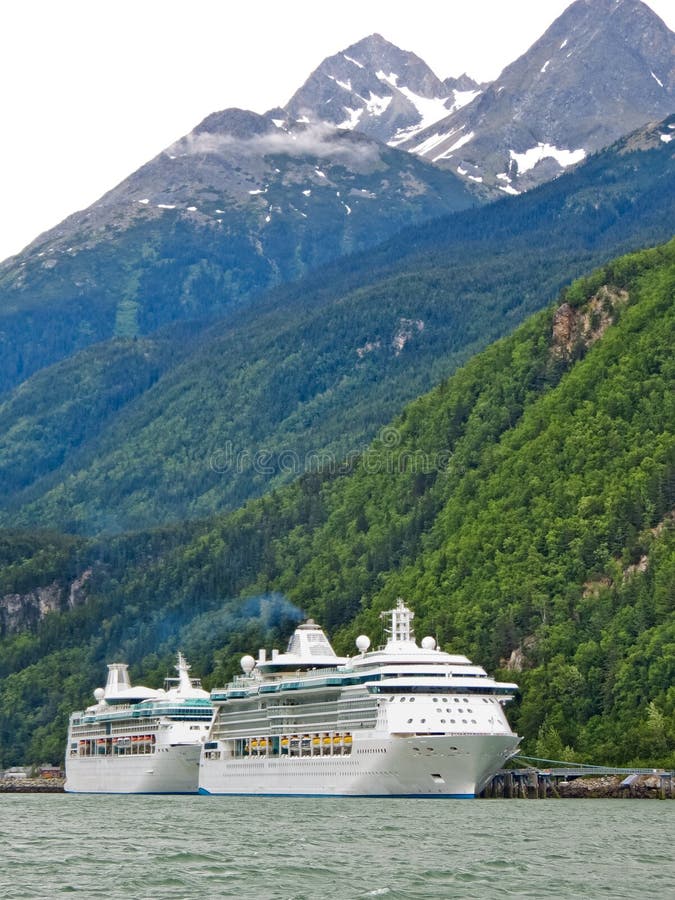 The Royal Caribbean Radiance of the Seas (front) and Rhapsody of the Seas (rear) cruise ships tied up at the Railroad dock in Skagway, Alaska. The Royal Caribbean Radiance of the Seas (front) and Rhapsody of the Seas (rear) cruise ships tied up at the Railroad dock in Skagway, Alaska.