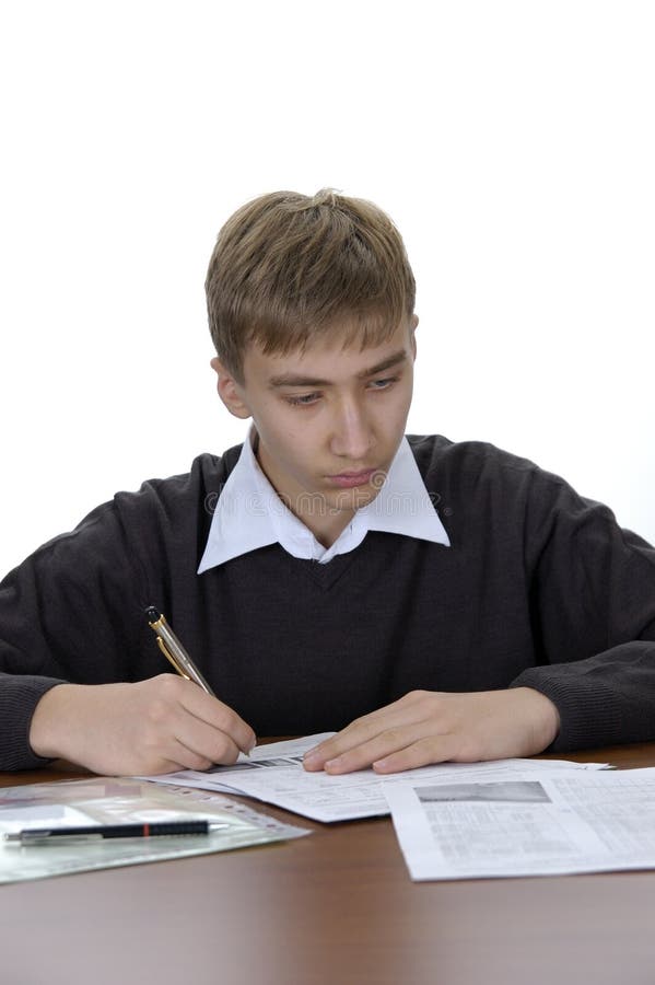 Studente fa i compiti fotografia stock libera da diritti
