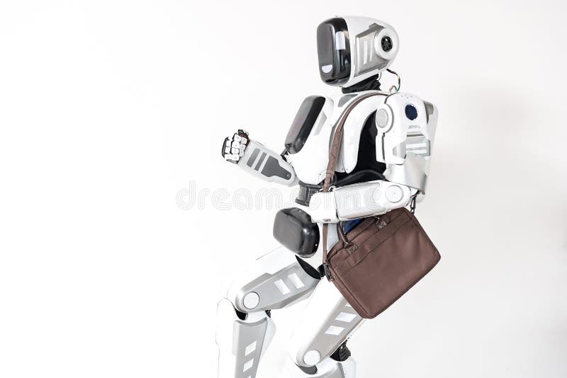 L'androïde intelligent fonctionne dans le bureau images stock L'androïde intelligent fonctionne dans le bureau images stock