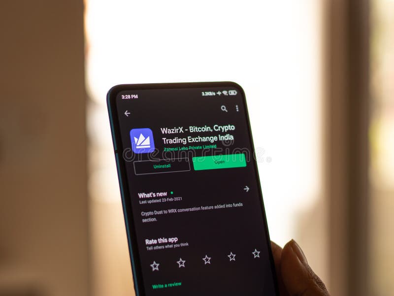 L'Assam l'India 10 marzo 2021 : Logo del wazirx sull'immagine degli stock dello schermo del telefono. immagini stock libere da diritti