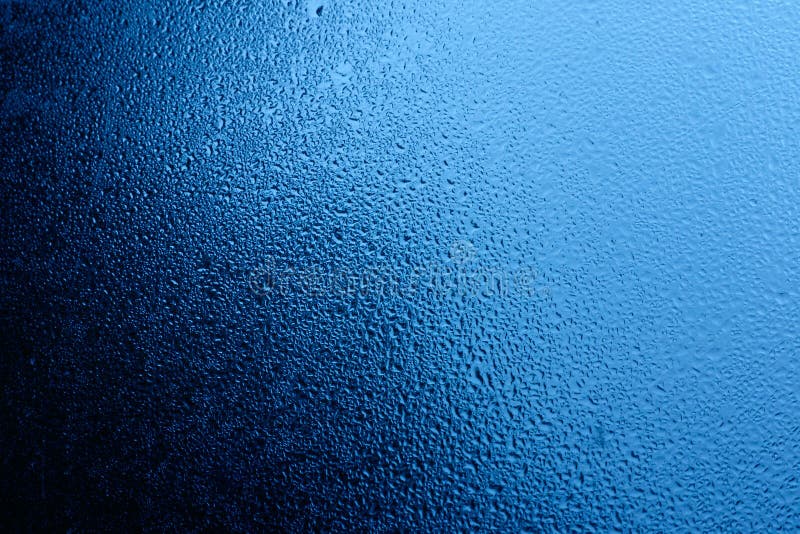 L'eau bleue sur l'hublot photo stock L'eau bleue sur l'hublot photo stock