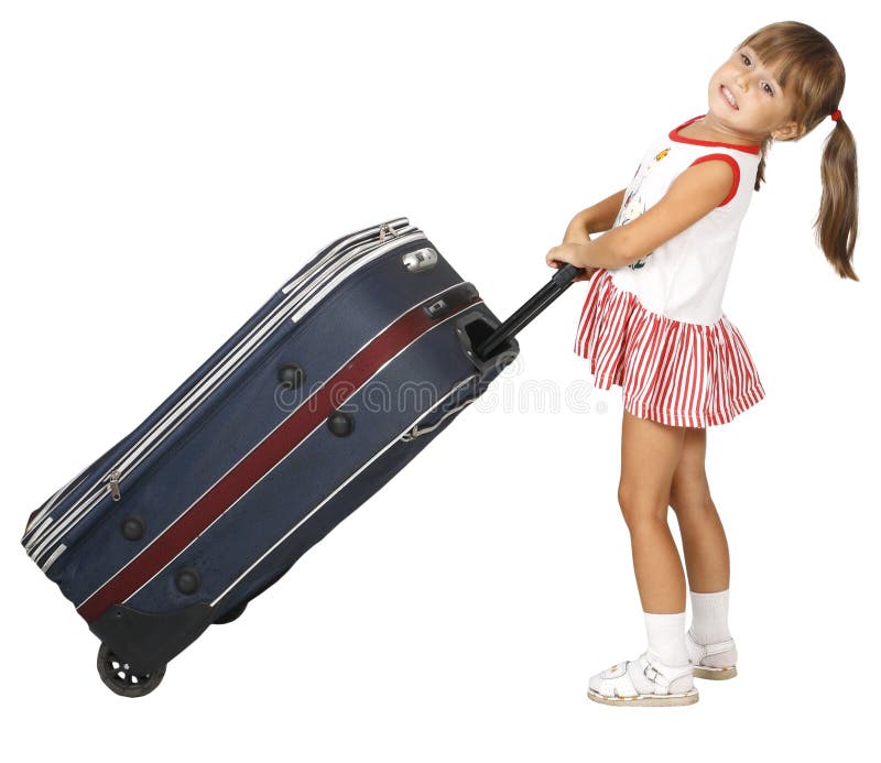 L'enfant tire le bagage image stock L'enfant tire le bagage image stock