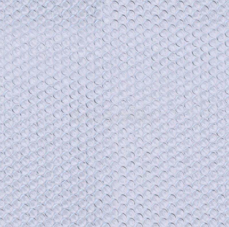 L'enveloppe de bulle en plastique a couvert de tuiles la texture photos stock L'enveloppe de bulle en plastique a couvert de tuiles la texture photos stock