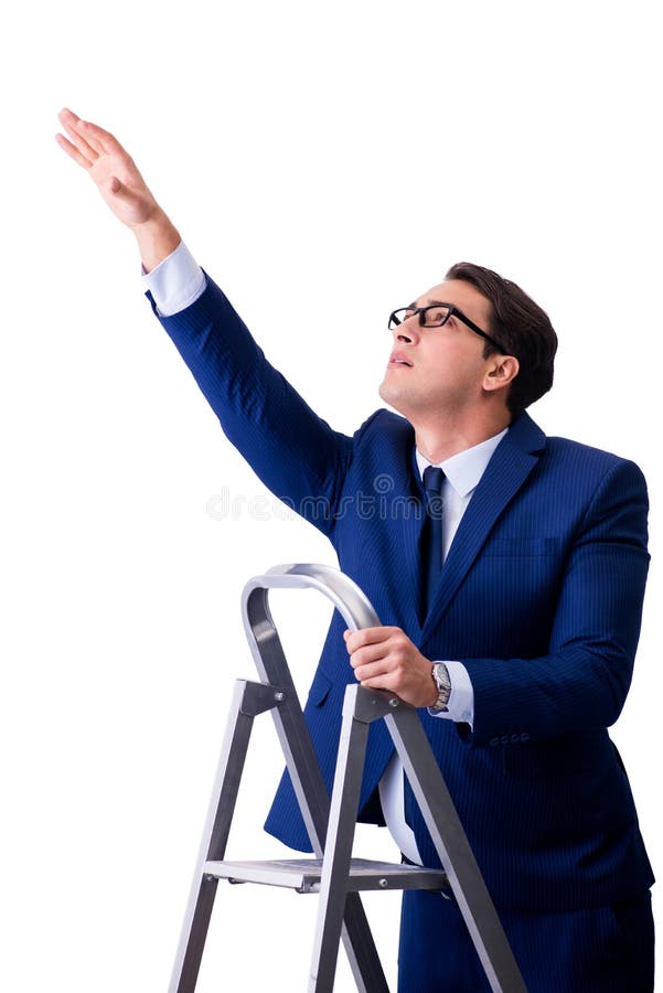 L'homme d'affaires au sommet de l'échelle d'isolement sur le fond blanc photographie stock L'homme d'affaires au sommet de l'échelle d'isolement sur le fond blanc photographie stock