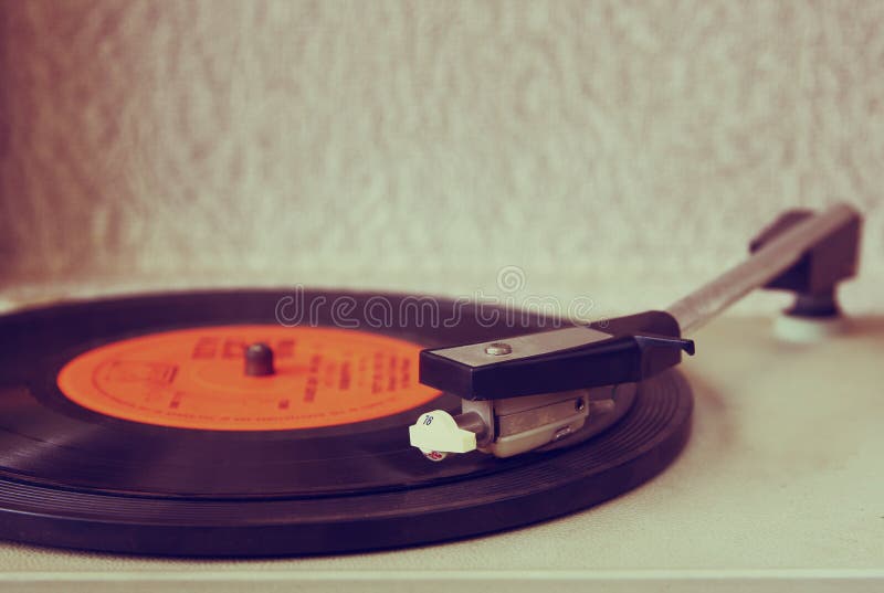 Image of old record player, image is retro filtered . selective focus. Image of old record player, image is retro filtered . selective focus.