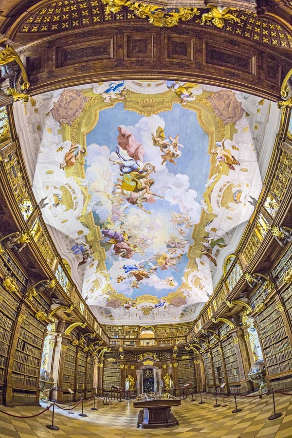 MELK, AUSTRIA - APRIL 23, 2015: The luxurious interior of the Library in Melk Abbeyin Melk, Austria. Famous Melk Abbey Library has over 100,000 Volumes in Collection. MELK, AUSTRIA - APRIL 23, 2015: The luxurious interior of the Library in Melk Abbeyin Melk, Austria. Famous Melk Abbey Library has over 100,000 Volumes in Collection.