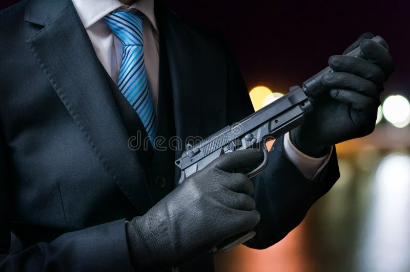 1,360 Pistola Con Il Silenziatore Foto Foto Stock Gratis e