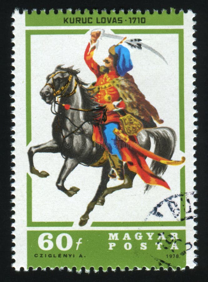 L'UNGHERIA - CIRCA 1978: Un francobollo stampato nelle manifestazioni dell'Ungheria mostra a Kuruc Lovas un la serie di cavalieri immagine stock L'UNGHERIA - CIRCA 1978: Un francobollo stampato nelle manifestazioni dell'Ungheria mostra a Kuruc Lovas un la serie di cavalieri immagine stock
