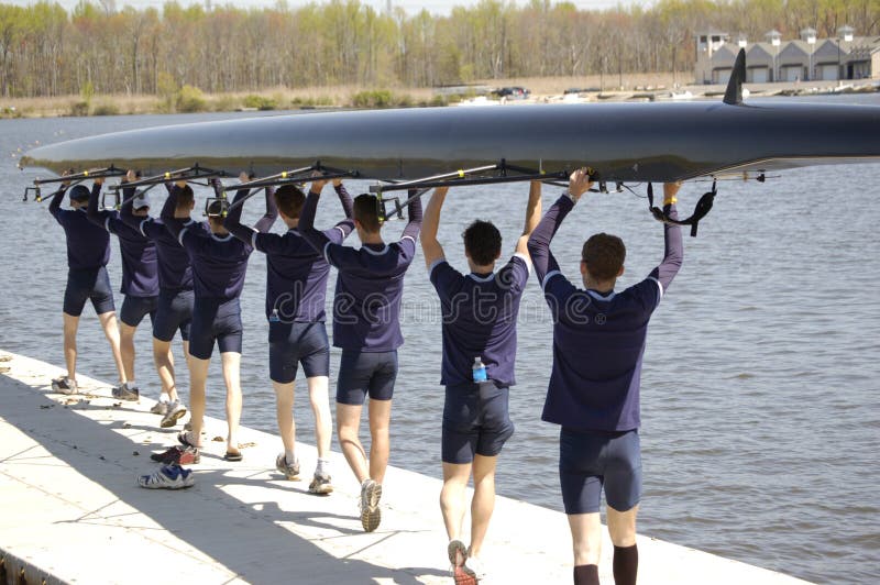 The Georgetown 8-man heavyweight crew prepares to set their boat in the water. The Georgetown 8-man heavyweight crew prepares to set their boat in the water