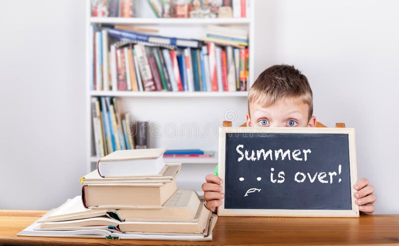 Summer is over! - drawn on a blackboard. Summer is over! - drawn on a blackboard.