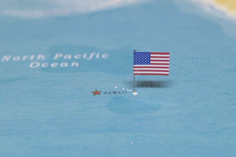La bandiera degli Stati Uniti sull'Hawai nella mappa di mondo fotografia stock libera da diritti La bandiera degli Stati Uniti sull'Hawai nella mappa di mondo fotografia stock libera da diritti