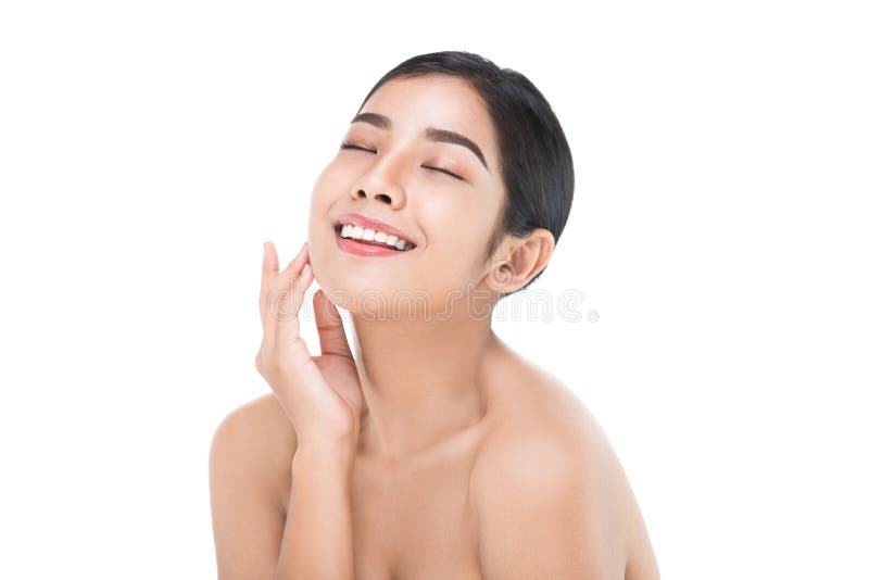 La bella donna si preoccupa per il fronte della pelle - posando allo studio su bianco fotografia stock La bella donna si preoccupa per il fronte della pelle - posando allo studio su bianco fotografia stock