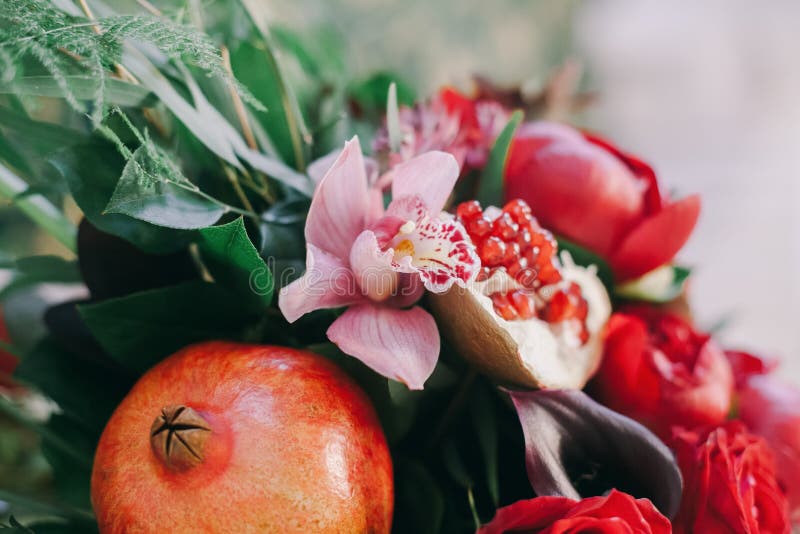 Flowers composition with grapefruit as a wedding decoration. Flowers composition with grapefruit as a wedding decoration