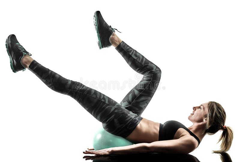 La boule molle de forme physique de pilates de femme exerce la silhouette d'isolement photographie stock La boule molle de forme physique de pilates de femme exerce la silhouette d'isolement photographie stock