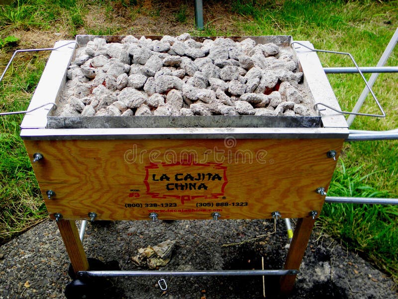 La Cajita China roasting box with charcoal in it. La Cajita China roasting box with charcoal in it.