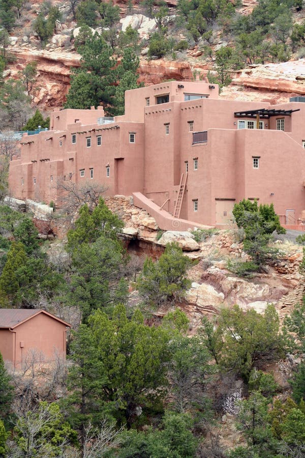 The Pueblo House at Manitou Cliff Dwellings in Manitou Springs, Colorado. The Pueblo House is built in a traditional pueblo architectural style and houses a museum and gift shop. It is a Colorado landmark. The Pueblo House at Manitou Cliff Dwellings in Manitou Springs, Colorado. The Pueblo House is built in a traditional pueblo architectural style and houses a museum and gift shop. It is a Colorado landmark.