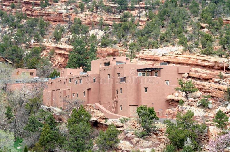 The Pueblo House at Manitou Cliff Dwellings in Manitou Springs, Colorado. The Pueblo House is built in a traditional pueblo architectural style and houses a museum and gift shop. It is a Colorado landmark. The Pueblo House at Manitou Cliff Dwellings in Manitou Springs, Colorado. The Pueblo House is built in a traditional pueblo architectural style and houses a museum and gift shop. It is a Colorado landmark.