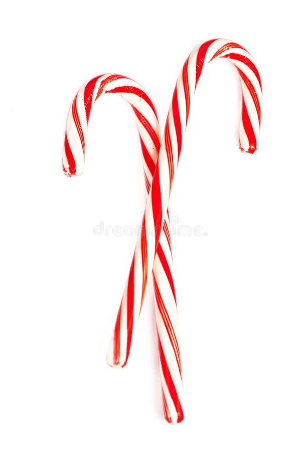 La canne de bonbon dur en bon état à Noël a barré d'isolement sur un backg blanc photos libres de droits La canne de bonbon dur en bon état à Noël a barré d'isolement sur un backg blanc photos libres de droits