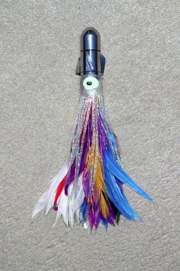 Feather skirted lure for big game angler fish colorful jet head. Feather skirted lure for big game angler fish colorful jet head