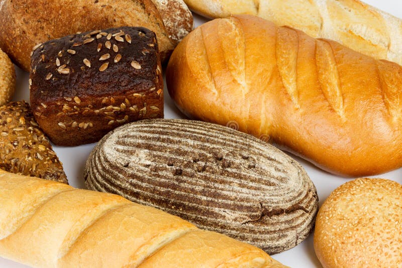 La composition avec du pain et les petits pains se ferment photos stock La composition avec du pain et les petits pains se ferment photos stock