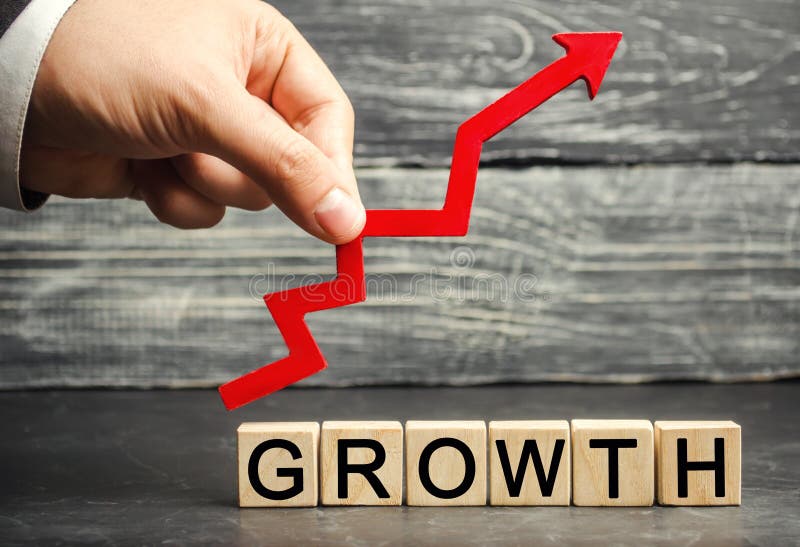The Inscription Growth and up arrow. The concept of a successful business. Increase in income, salary. The growth of the company`s budget. Increased investment spending, economy and finance. The Inscription Growth and up arrow. The concept of a successful business. Increase in income, salary. The growth of the company`s budget. Increased investment spending, economy and finance.