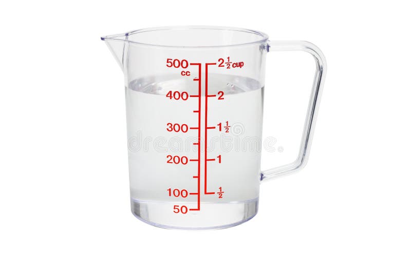 La cuvette de mesure en plastique de cuisine a rempli avec de l'eau photographie stock La cuvette de mesure en plastique de cuisine a rempli avec de l'eau photographie stock