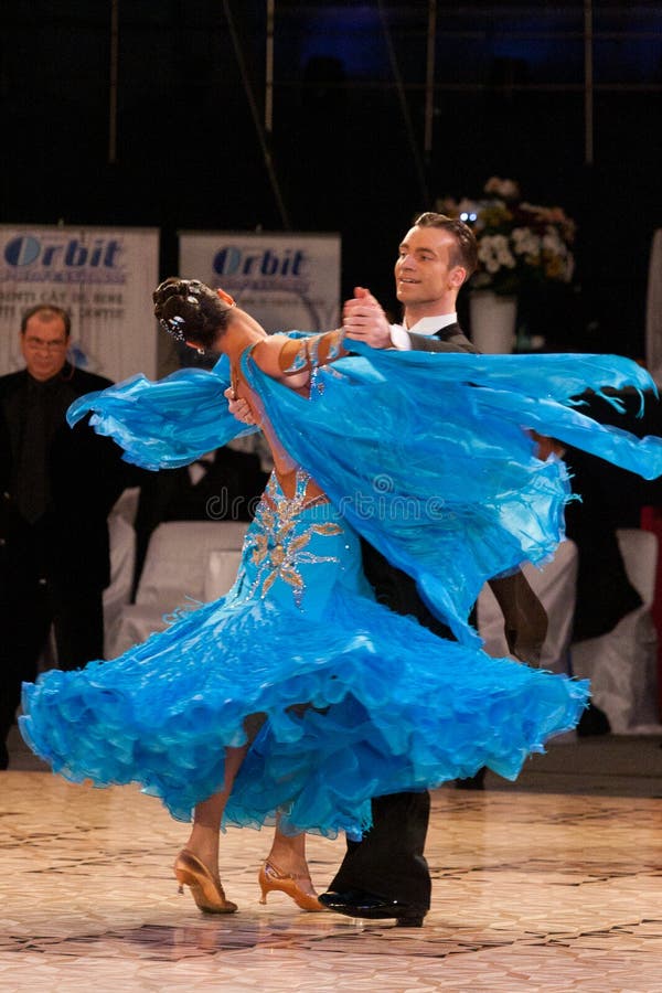 BUCHAREST - APRIL 17: Unknown ballroom dancers, compete at IDSF (International Dance Sport Federation) Dance Masters on April 17, 2011 in Bucharest, Romania. BUCHAREST - APRIL 17: Unknown ballroom dancers, compete at IDSF (International Dance Sport Federation) Dance Masters on April 17, 2011 in Bucharest, Romania