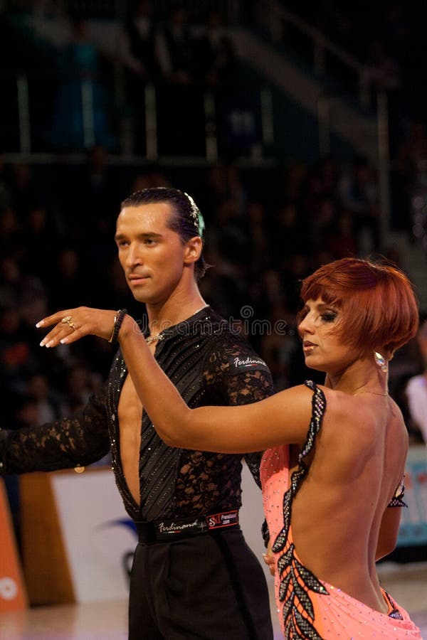 BUCHAREST - APRIL 17: Pavel Pachechnik / Francesca Berardi, winners of Adult Latin Open, IDSF (International DanceSport Federation) Dance Masters competition on April 17, 2011 in Bucharest, Romania. BUCHAREST - APRIL 17: Pavel Pachechnik / Francesca Berardi, winners of Adult Latin Open, IDSF (International DanceSport Federation) Dance Masters competition on April 17, 2011 in Bucharest, Romania