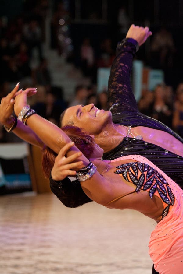 BUCHAREST - APRIL 17: Pavel Pachechnik / Francesca Berardi, winners of Adult Latin Open, IDSF (International DanceSport Federation) Dance Masters competition on April 17, 2011 in Bucharest, Romania. BUCHAREST - APRIL 17: Pavel Pachechnik / Francesca Berardi, winners of Adult Latin Open, IDSF (International DanceSport Federation) Dance Masters competition on April 17, 2011 in Bucharest, Romania