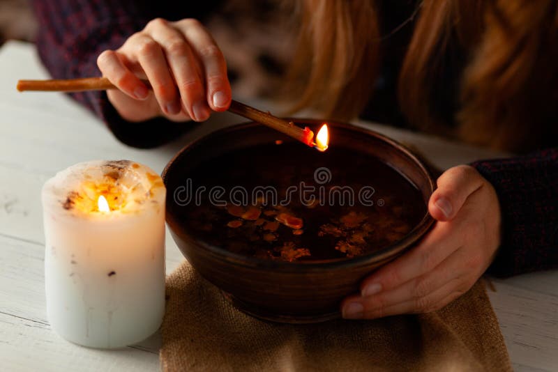 Magic divination by wax on the water, ritual. Psychic vision, fortune teller. Magic divination by wax on the water, ritual. Psychic vision, fortune teller.