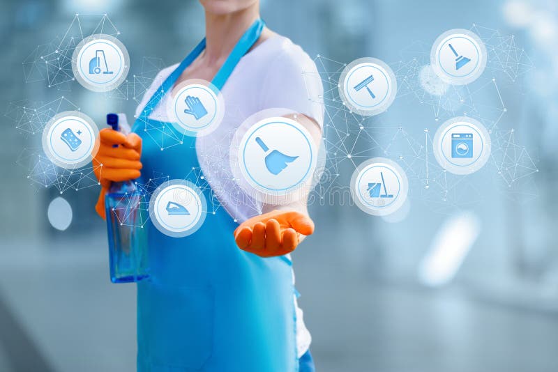 The cleaning lady shows the structure of the housekeeping service on blurred background. The cleaning lady shows the structure of the housekeeping service on blurred background