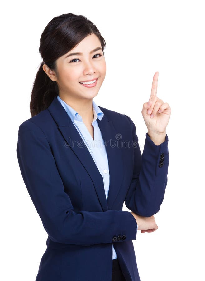 La donna di affari con il dito precisa fotografia stock libera da diritti La donna di affari con il dito precisa fotografia stock libera da diritti