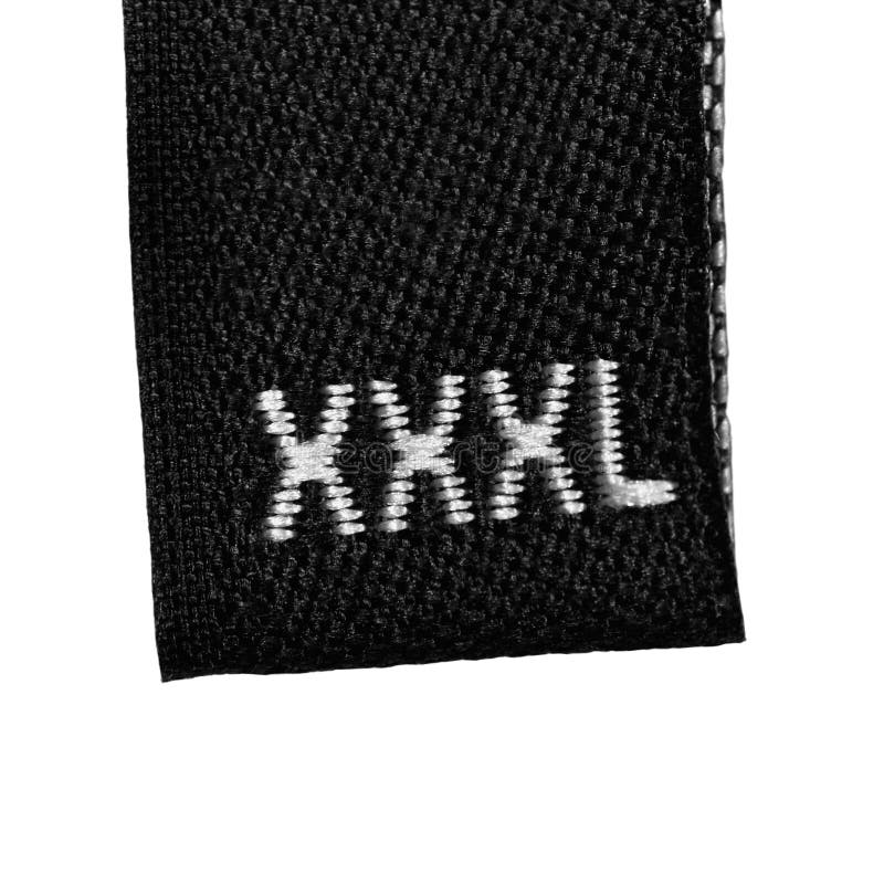La etiqueta de la escritura de la etiqueta de la ropa de la talla de XXXL, se ennegrece aislado imagen de archivo libre de regalías La etiqueta de la escritura de la etiqueta de la ropa de la talla de XXXL, se ennegrece aislado imagen de archivo libre de regalías