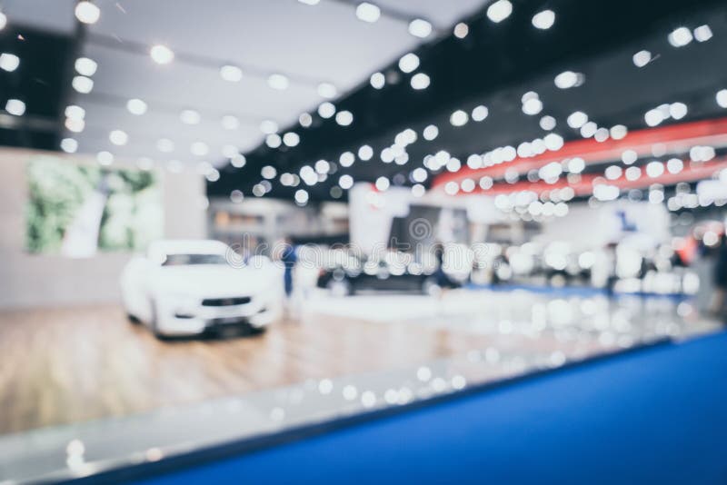 La falta de definición abstracta y la exposición defocused del coche y de motor muestran evento imagen de archivo La falta de definición abstracta y la exposición defocused del coche y de motor muestran evento imagen de archivo