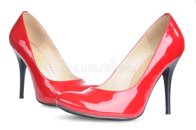La femelle rouge chausse de hauts talons d'isolement photographie stock libre de droits La femelle rouge chausse de hauts talons d'isolement photographie stock libre de droits