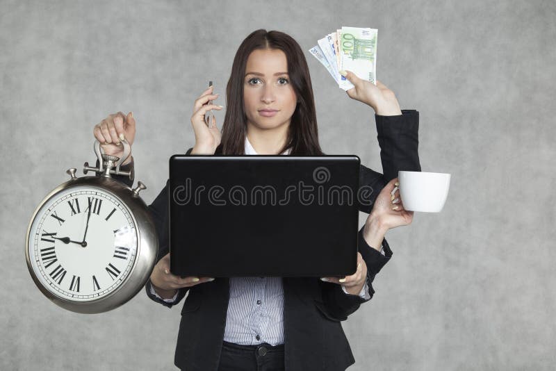 La femme d'affaires est très multitâche photos stock La femme d'affaires est très multitâche photos stock