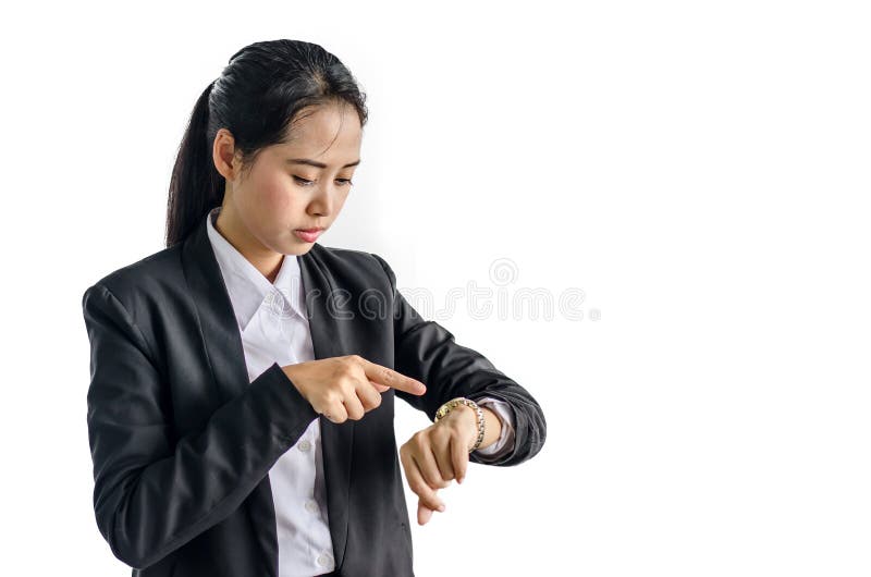 La femme d'affaires vérifie le temps sur sa montre-bracelet, temps, concept en retard, d'isolement sur le fond blanc photographie stock libre de droits La femme d'affaires vérifie le temps sur sa montre-bracelet, temps, concept en retard, d'isolement sur le fond blanc photographie stock libre de droits