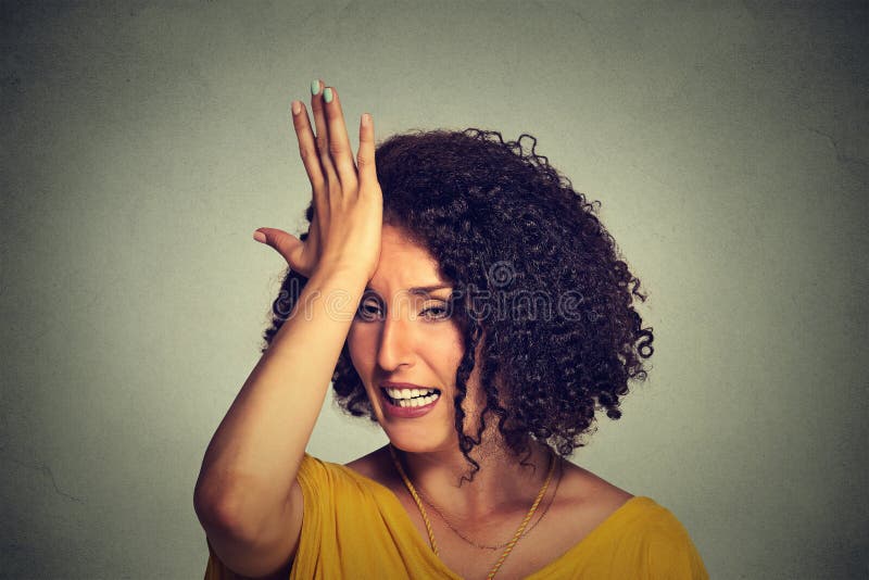 Closeup portrait middle age woman slapping hand on head to say duh made mistake isolated on gray background. Negative human emotion facial expression feelings, body language. Closeup portrait middle age woman slapping hand on head to say duh made mistake isolated on gray background. Negative human emotion facial expression feelings, body language