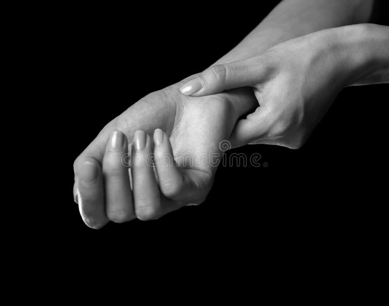 La femme tient son poignet, syndrome de carpal photographie stock La femme tient son poignet, syndrome de carpal photographie stock