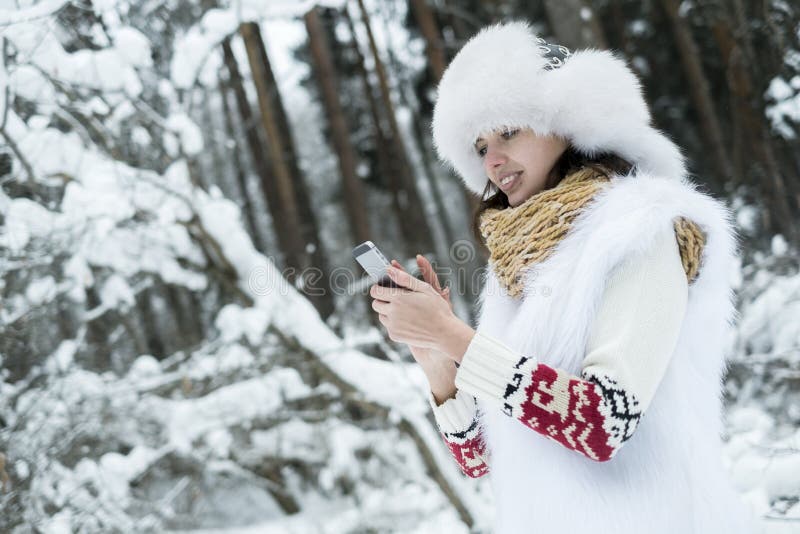 La fille dans des mitaines photographie stock libre de droits