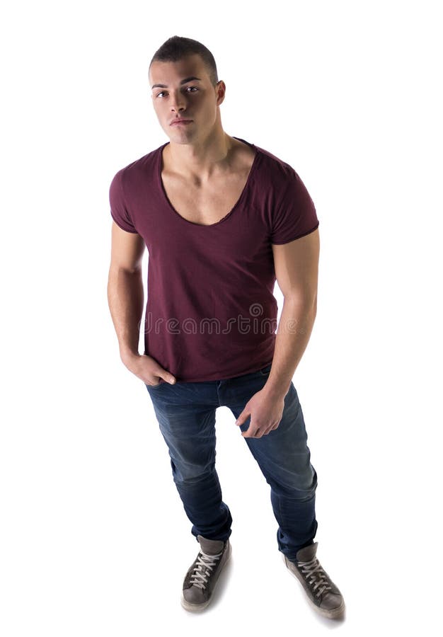 La foto piena del corpo del giovane bello con la maglietta ha sparato da sopra fotografia stock La foto piena del corpo del giovane bello con la maglietta ha sparato da sopra fotografia stock