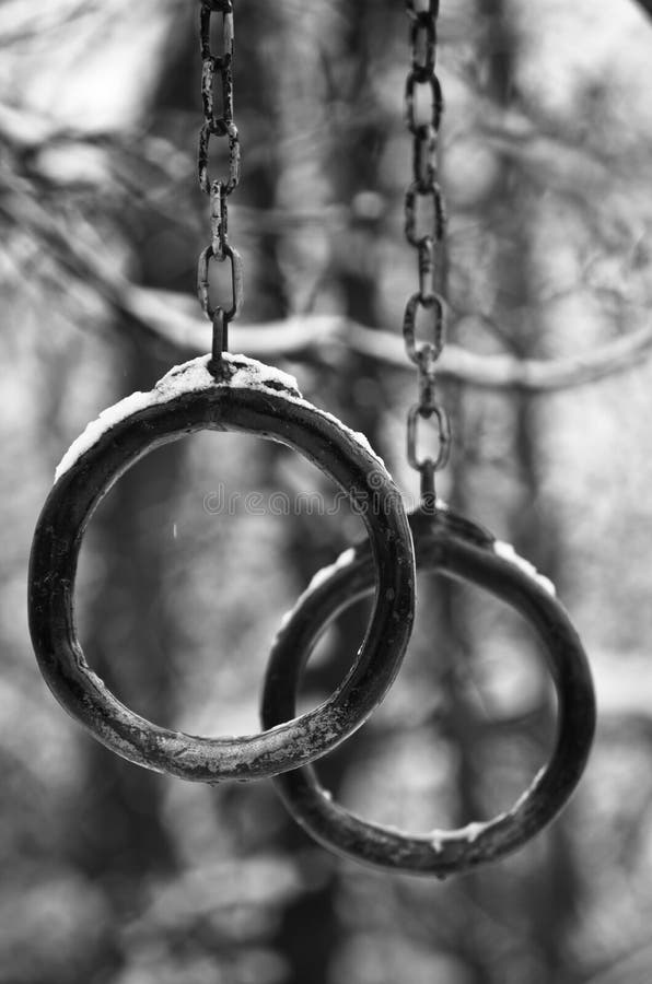 Gymnastics still rings at recreational center during winter, Kosutnjak forest, Belgrade Serbia. Gymnastics still rings at recreational center during winter, Kosutnjak forest, Belgrade Serbia