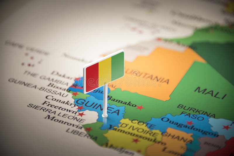 La Guinée Belgique a identifié par un drapeau sur la carte photos stock La Guinée Belgique a identifié par un drapeau sur la carte photos stock