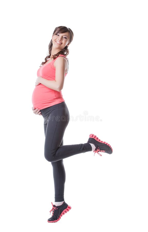 La imagen de la mujer embarazada feliz enganchó a aeróbicos fotos de archivo La imagen de la mujer embarazada feliz enganchó a aeróbicos fotos de archivo