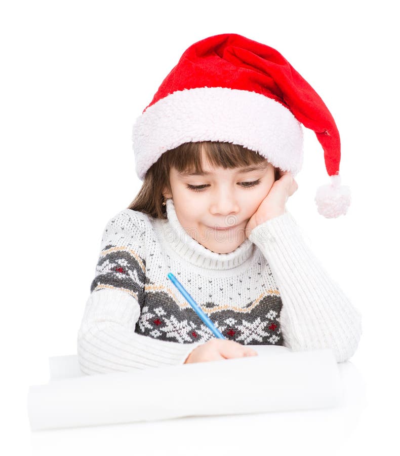 La jeune fille dans le chapeau de Santa écrit la lettre à Santa D'isolement sur le blanc photo libre de droits La jeune fille dans le chapeau de Santa écrit la lettre à Santa D'isolement sur le blanc photo libre de droits