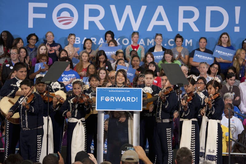 Young hispanic girl speaks at President Obama campaign rally at Orr Middle School in Las Vegas, October 26, 2012. Young hispanic girl speaks at President Obama campaign rally at Orr Middle School in Las Vegas, October 26, 2012