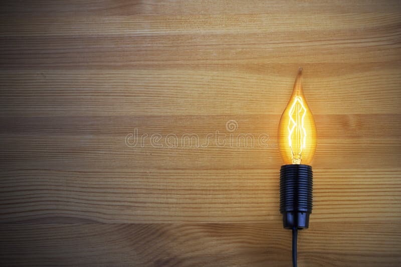 Download La Lumière D'une Lampe à Incandescence Photo stock - Image du innovation, électrique: 77154042