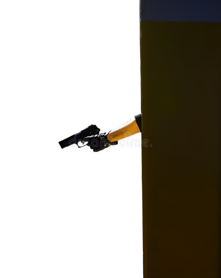 La main de la femme avec une arme à feu d'isolement sur le fond blanc photo libre de droits La main de la femme avec une arme à feu d'isolement sur le fond blanc photo libre de droits